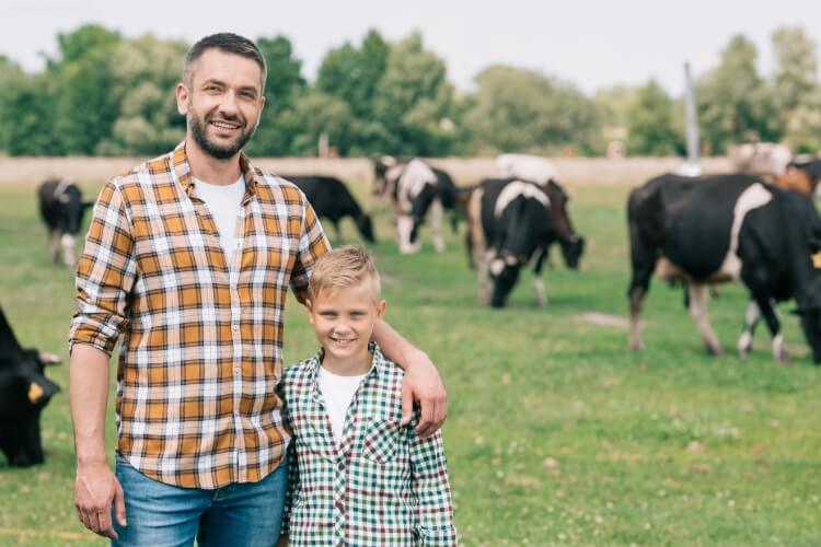 Father and Son in Cow Pasture,AWest Security, Bismarck,  ND